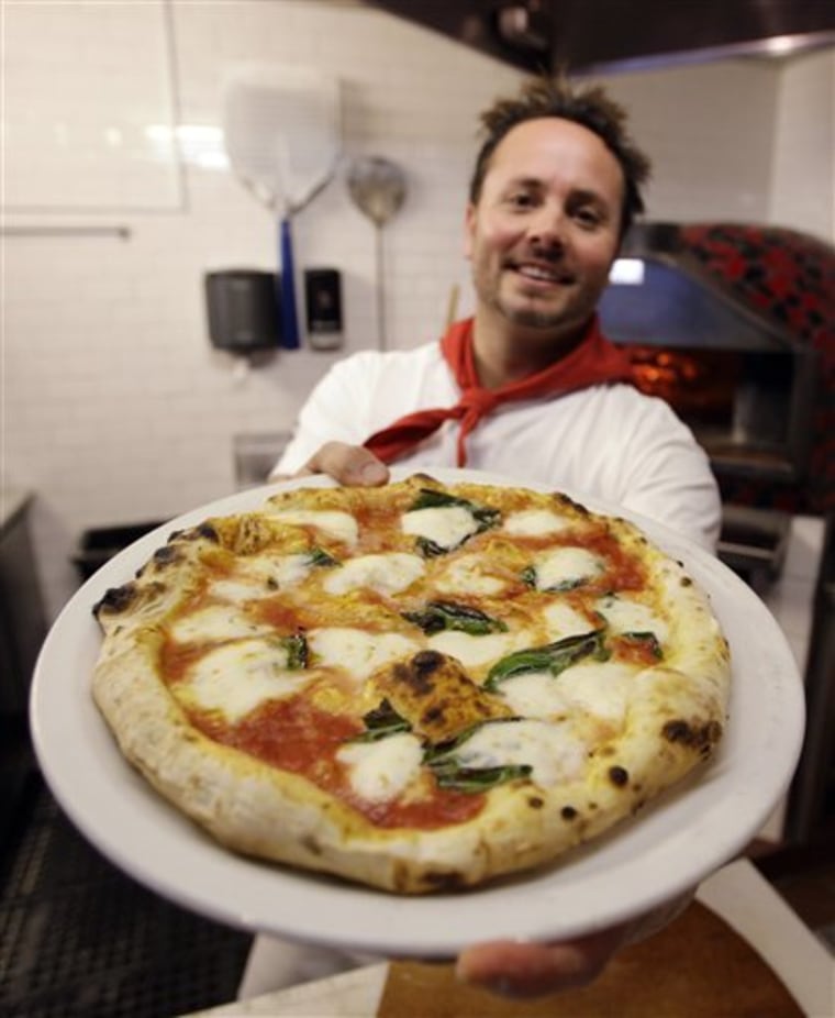 "Between all four stores, we'll do over 2,000 pizzas at least," says Tony Gemignani, who owns two pizza restaurants in Northern California. "It's a lot of pizza. It's a lot of flour. It's a lot of cheese."